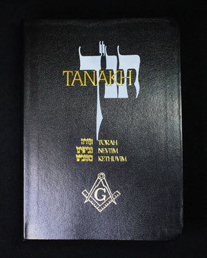 Black book cover with 'Tanakh' text and Masonic symbols on a black background