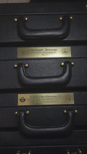 Personalized Masonic brass nameplates showing various laser-engraved logos and lettering options.